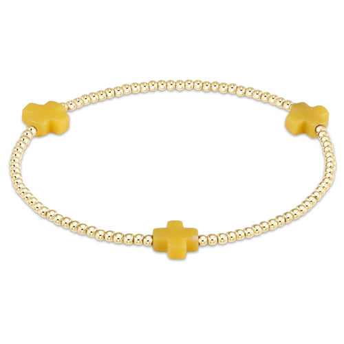 signature cross gold pattern 2mm bead bracelet canary